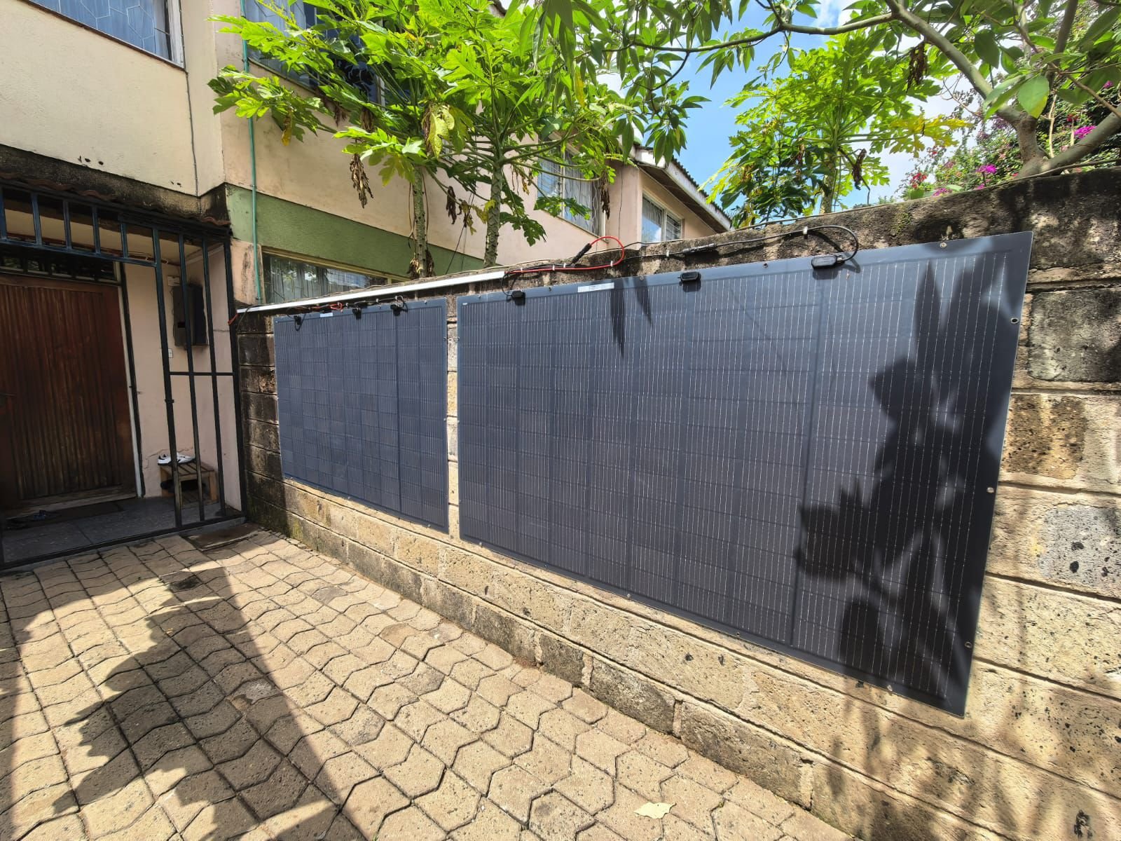 Ngumo — panel installation, courtyard view